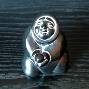 Boma Canada Child Holding a Snowball Black Resin Figurine
